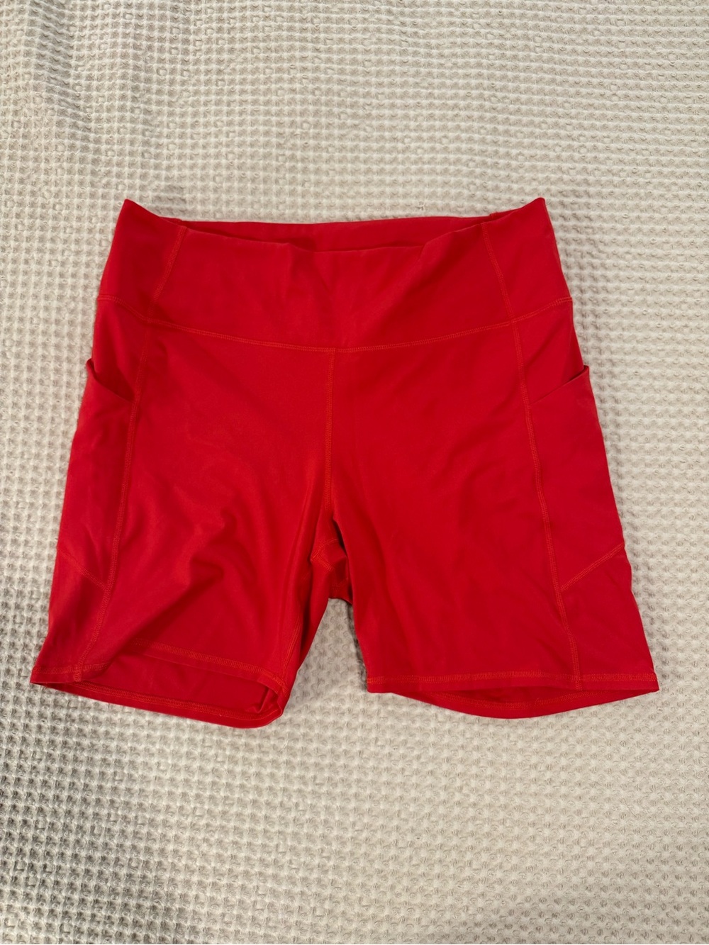 Fabletics Bright Red High-Rise Bike Shorts with Side Pockets